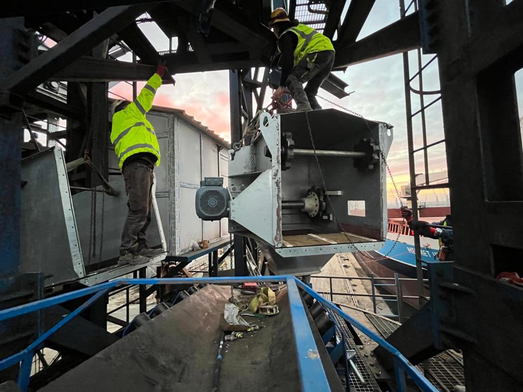 workers building grain handling terminal